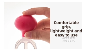 Ergonomic handheld scalp massager with pink handle and flexible massage claws for relaxation