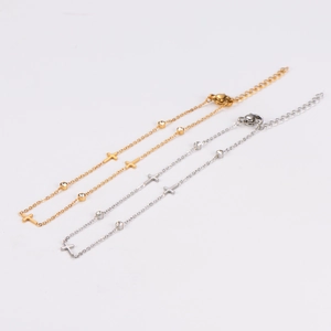 Minimalist stainless steel anklets with cross pendants in gold and silver finish
