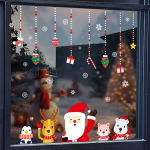 Christmas window decals with Santa Claus, reindeer and snowflakes for festive glass decoration