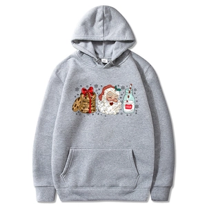 Grey Christmas hoodie with festive milk and cookies print, front view on white background