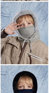 Close-up of windproof children's winter hat with warm fleece lining and integrated mask