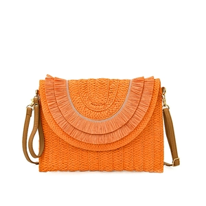 Close-up of bright orange raffia envelope bag with layered fringe and gold metal hardware