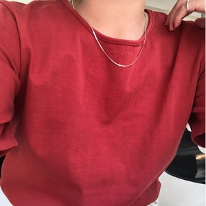 Classic 925 sterling silver snake bone chain necklace worn on neck for a minimalist look