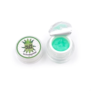 Detailed macro view of 5g aloe vera lash extension glue remover with green gel texture