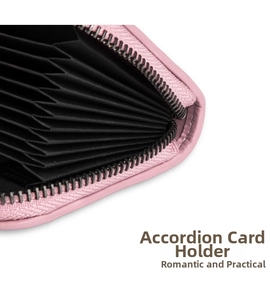 Pink leather card holder with accordion-style slots and secure zipper closure for women