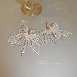 Elegant white lace bow earrings with pearl tassels and sparkling zircon stones for women
