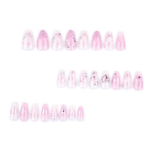 Pink and white gradient almond press-on nails with 3D bows, rhinestones and pearls
