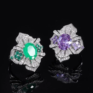 Vintage style rings featuring oval emerald green and royal purple zircon in silver finish