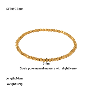 Detail showing 3mm gold beads stainless steel elastic bracelet with size specifications