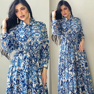 Women's long sleeve floral maxi dress with white and blue majolica print and tie waist