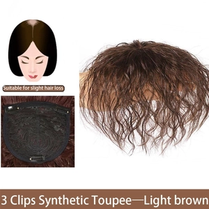 Synthetic hair topper detail view showing 3 clips inner net and fluffy curly hair.