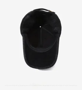 Interior detail of winter wool baseball cap featuring reinforced stitching and inner lining