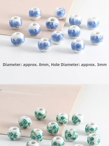 Close-up of 8mm ceramic beads with blue plum and green floral patterns for DIY jewelry