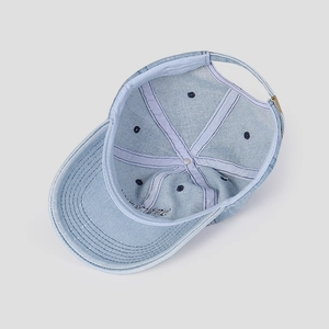 Internal view of a light blue 3D embroidered denim baseball cap with inner reinforcement