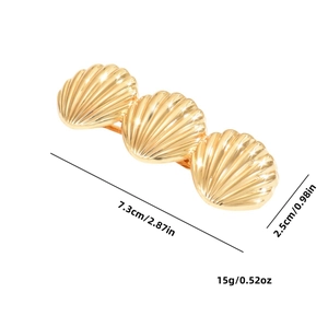 Three-piece golden shell-shaped metal hair clip with detailed size and weight specifications