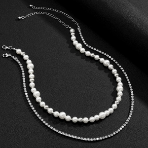 Detail of double-layer necklace set with pearls, rhinestones, and lobster clasps