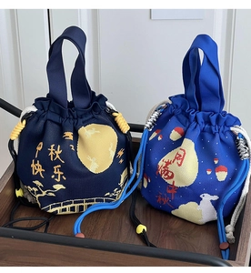 Detailed knit texture of blue Mid-Autumn themed crossbody strap pouches with moon and bunny
