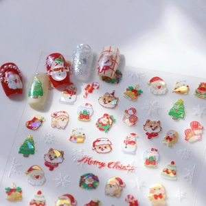 3D Christmas embossed nail stickers featuring Santa, trees and glittery laser effects