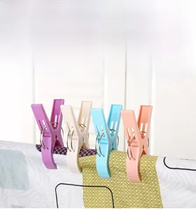 Close-up of colorful heavy duty plastic quilt clips with strong double metal springs