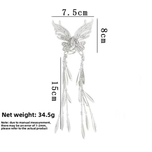 Detailed view of butterfly hair claw with silver tassels showing size and weight specs