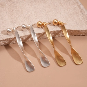 Twisted metal drop earrings with pearl studs in gold and silver finish for women