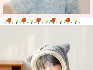 Detail of grey plush children hood with transparent mask and warm scarf integrated