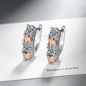 Sparkling S925 sterling silver huggie earrings with white and champagne zirconia stones