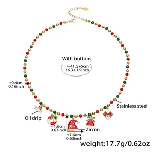 Detail view of colorful Christmas necklace beads and enamel holiday charms