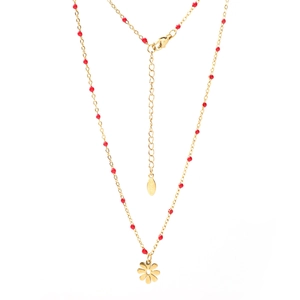 Detailed close-up of golden stainless steel chain with red beads and daisy flower pendant
