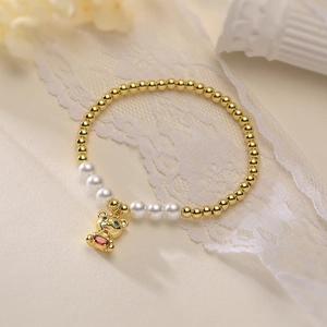 Gold-plated beaded bracelet with white pearls and a luxury zircon bear pendant charm