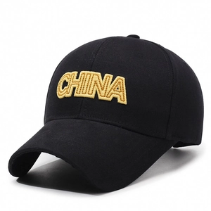 Classic black baseball cap with premium gold China embroidery and structured brim