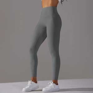 Vue latérale du legging de yoga taille haute sans couture gris avec effet push-up