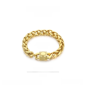 Macro detail of 10mm golden stainless steel chain bracelet with a square clasp closure