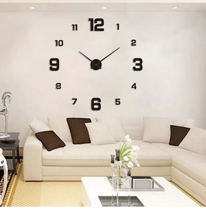 Modern black frameless 3D DIY wall clock featuring luminous numbers in a living room setting