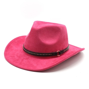 Detail of rose red suede cowboy hat featuring a black studded leather band with gold buckle