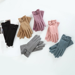 Women's fleece-lined thermal gloves in six colors with bows and touchscreen fingertips