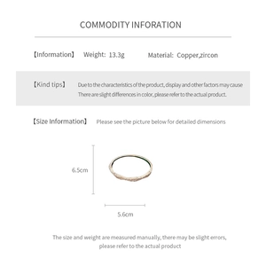 Macro detail of rose gold-plated zircon bangle with dimensions 6.5cm by 5.6cm