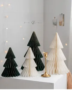 Detailed view of honeycomb paper Christmas tree ornaments with elegant gold edges