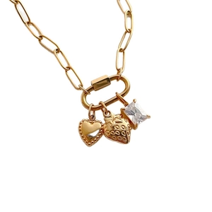 Gouden roestvrijstalen armband met hart-, aardbei- en zirkonia-bedels
