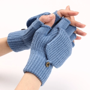 Blue knitted convertible fingerless gloves with brown button detail for winter warmth