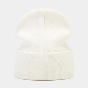 Detailed view of the fine knit texture and folded cuff on a white winter beanie hat