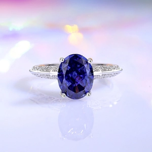 S925 Sterling Silver Angel Wings Ring with Oval Purple Stone and Pave Side Diamonds