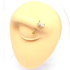 Detail of golden butterfly eyebrow ring with sparkling crystals on silicone model