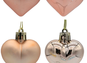 Detail view of heart-shaped rose gold ornaments in matte and glossy electroplated finishes