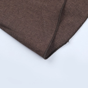 Detail of dark brown knit dress fabric with invisible zipper and thick woven texture