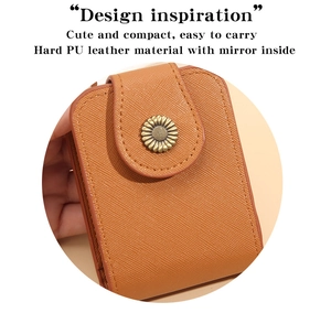 Close-up of brown PU leather makeup box with mirror and vintage sunflower snap button