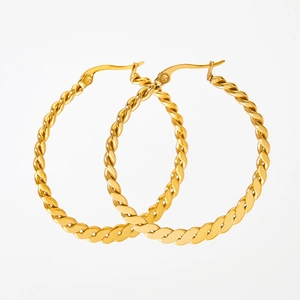 Golden matte twisted hoop earrings in stainless steel with a minimalist hollow texture