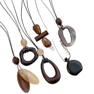 Bohemian retro resin geometric pendant necklace set with marble texture on white background