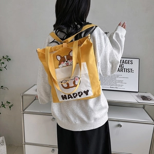 Yellow and white Corgi canvas tote bag with large capacity for students and casual use