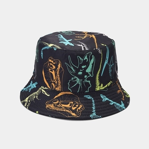 Detailed view of colorful dinosaur fossil patterns and quilting on black bucket hat